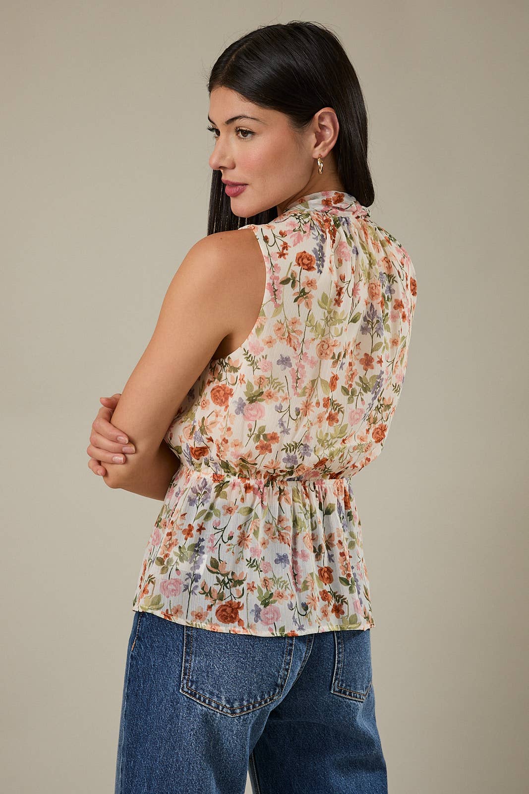 V NECK SLEEVELESS SURPLICE PEPLUM TOP