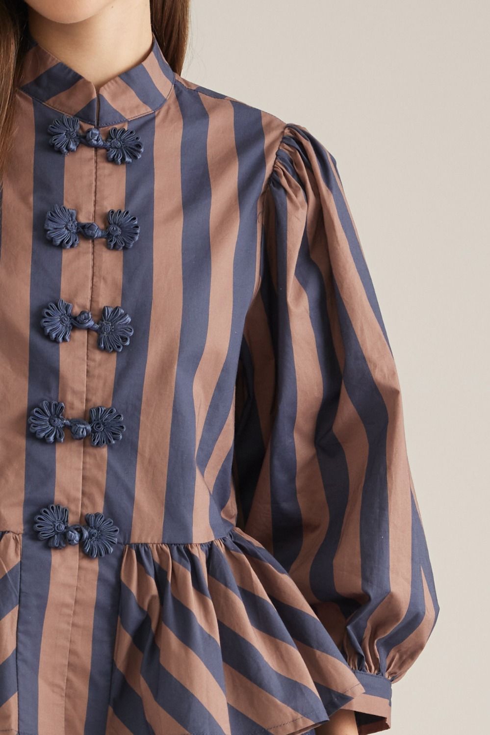 The Madison Peplum Top